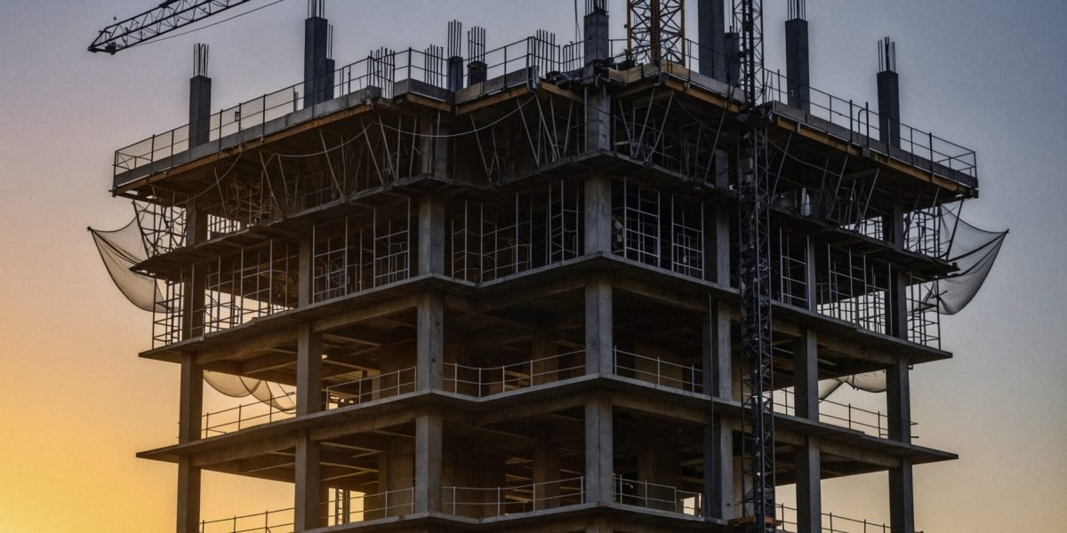 construction-high-rise-building-sunset